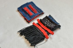Recycled patches of fabric sewn together with running stitches