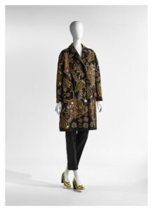 Black jacket featuring vines with pomegranate motifs in golden embroidery, with golden thread, cannetille, appliqué laces and sequin embroidery