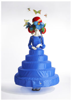 Mannequin in red butterfly hat, wearing bright blue dress and hoop skirt