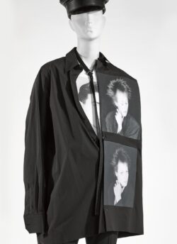 Mannequin in black top with pictures